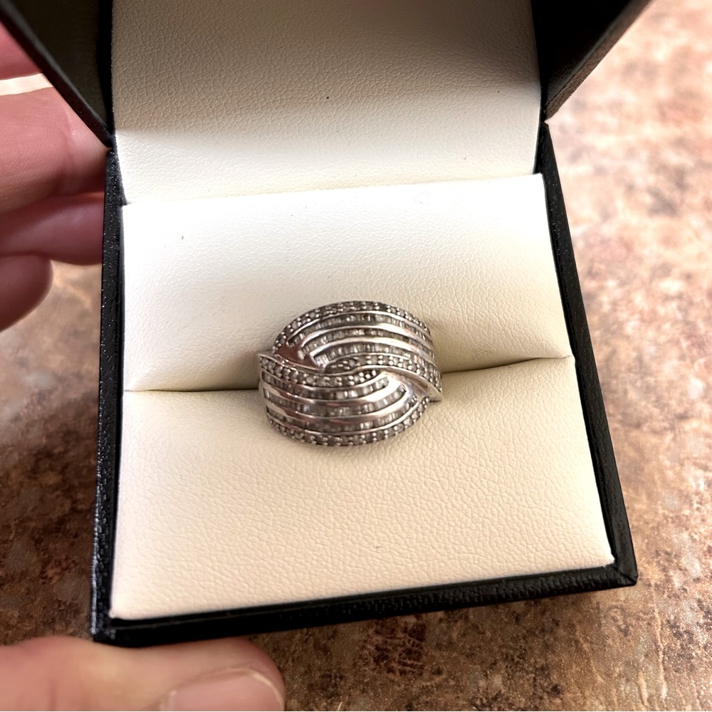 Genuine Diamonds ring size 7.